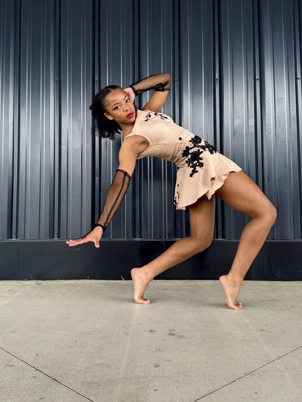 A dancer in a dramatic backbend